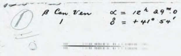 Image of a photographic glass plate showing a spectrum of a star