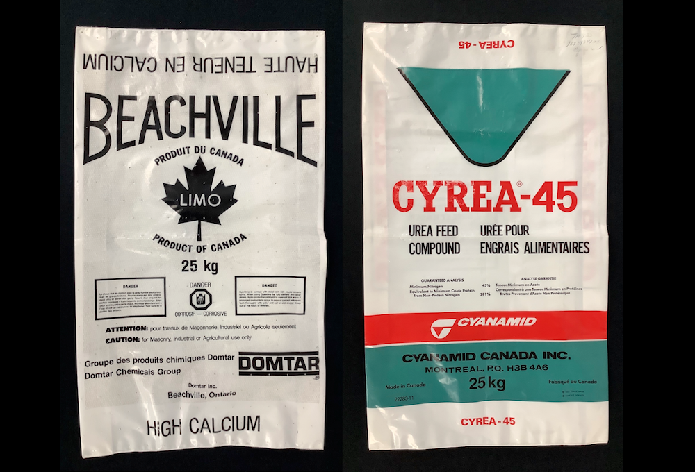 Two 25 kilogram shipping bags positioned side by side -The one the left reads "Beachville Limo". The one on the right reads "Cyrea-45".