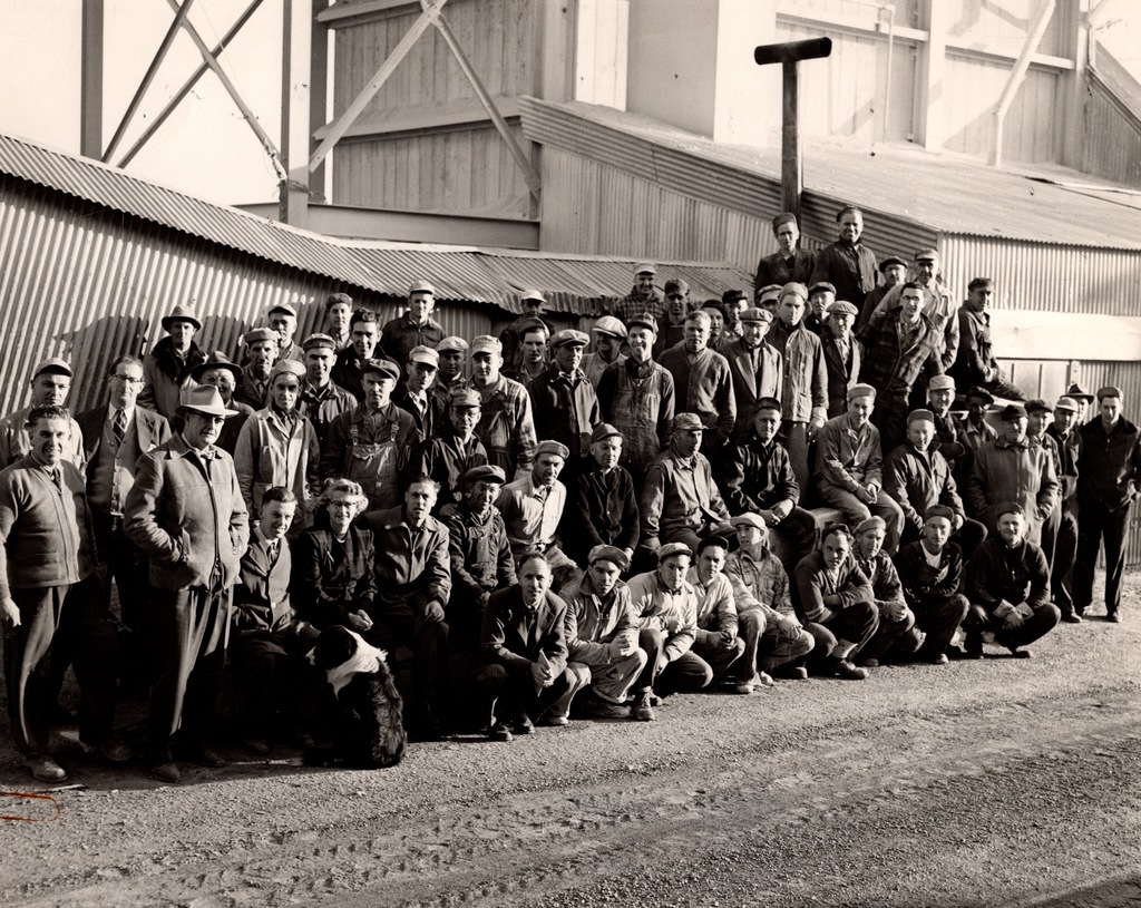 A group of workers outside of the quarry