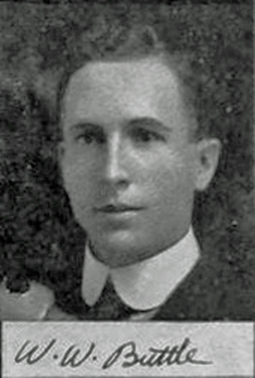 Black and white photographic portrait of Dr. Walter William Buttle, a young man wearing a white shirt, jacket and tie.