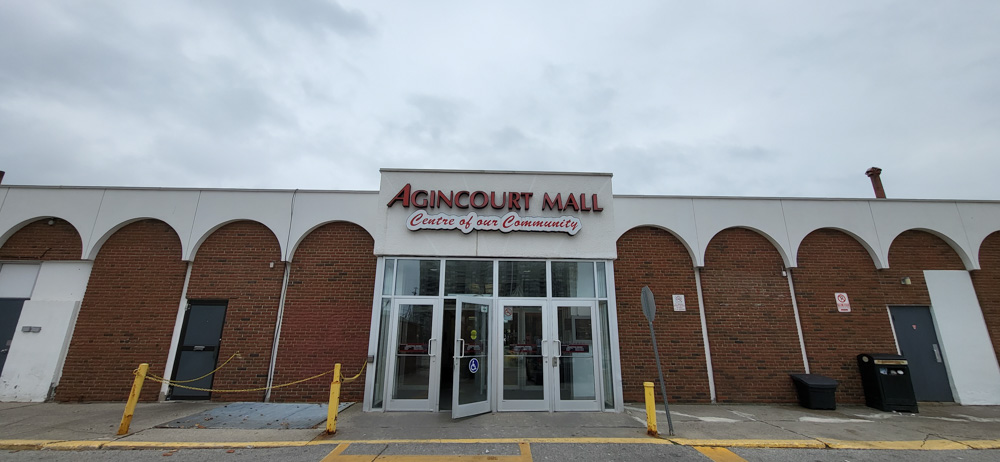 The front entrance of Agincourt Mall, written in large red letters with the subheading 