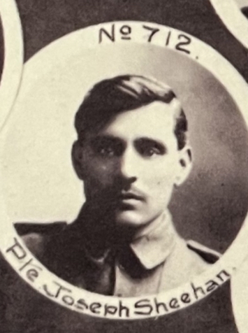 Sepia portrait of a man with dark hair, moustache, and eyes wearing a military uniform. The portrait is circular with the words No 712 Pte Joseph Sheehan around the portrait. There are other partial circular photos in the background on a black paper background.