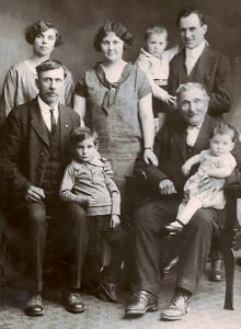 Studio photo of 8 people seated and standing