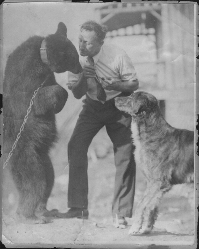 Alvin Baker with his pet bear and dog | Portraits of Our Ancestors