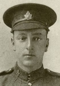 Portrait of a soldier wearing peak hat.